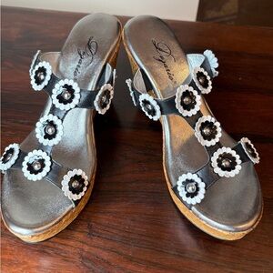 Black and White Strappy Wedge Sandals with Floral Accents with textured heel